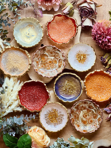 Resin jewelry bowls in various colors with gold