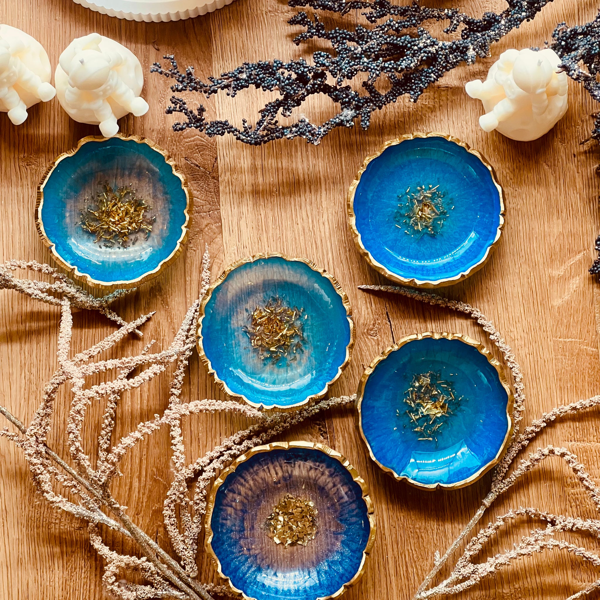 Resin jewelery bowls in blue, turquoise and green with gold