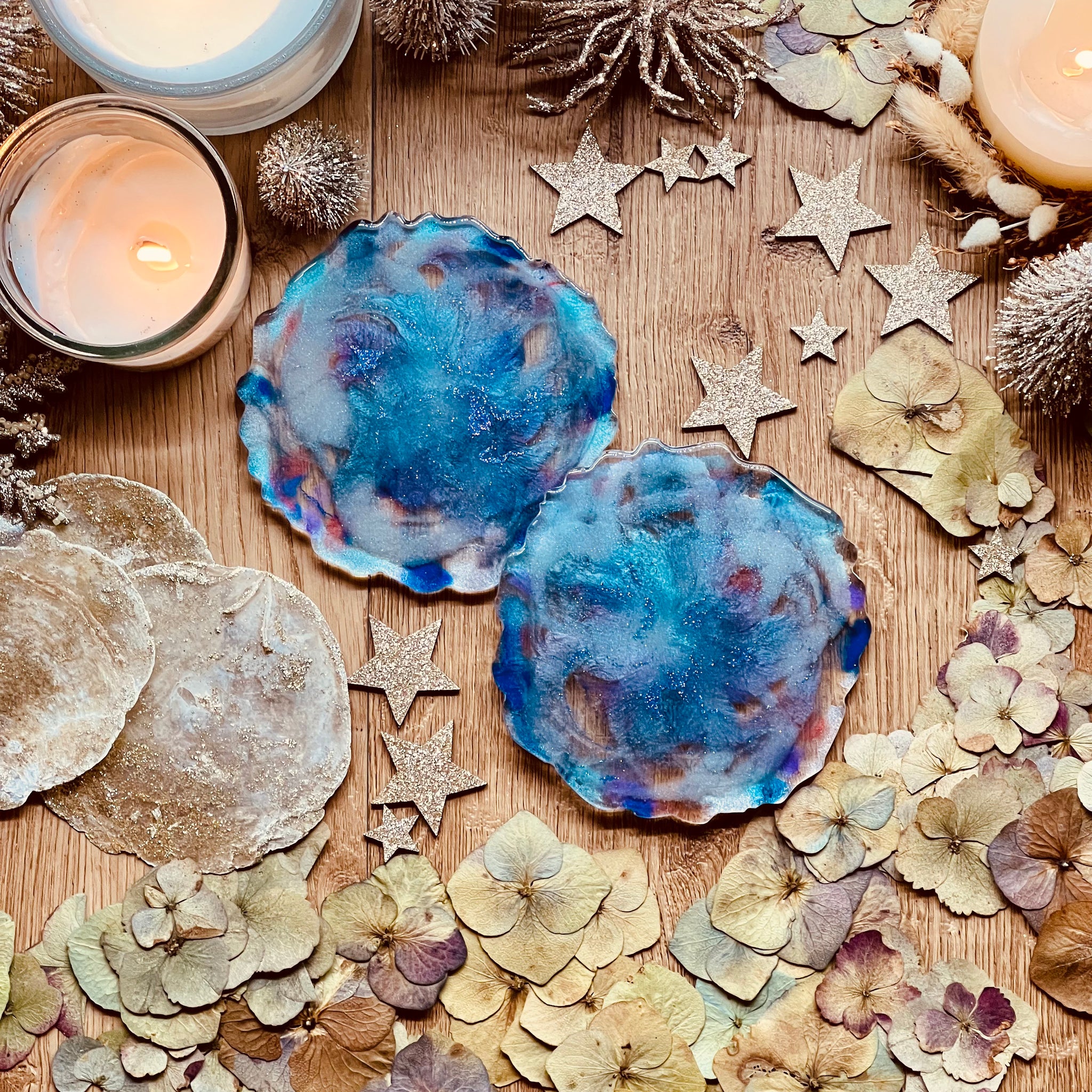 2 resin coasters in shades of blue