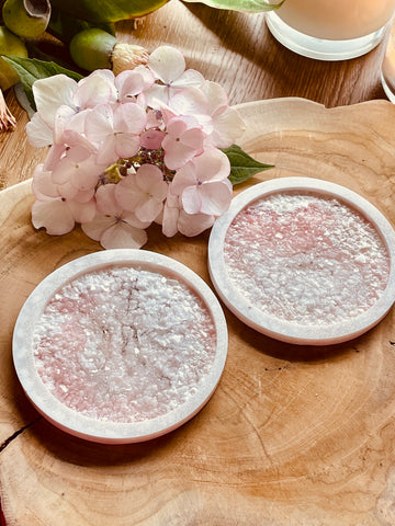 2 pink resin coasters with diamond finish