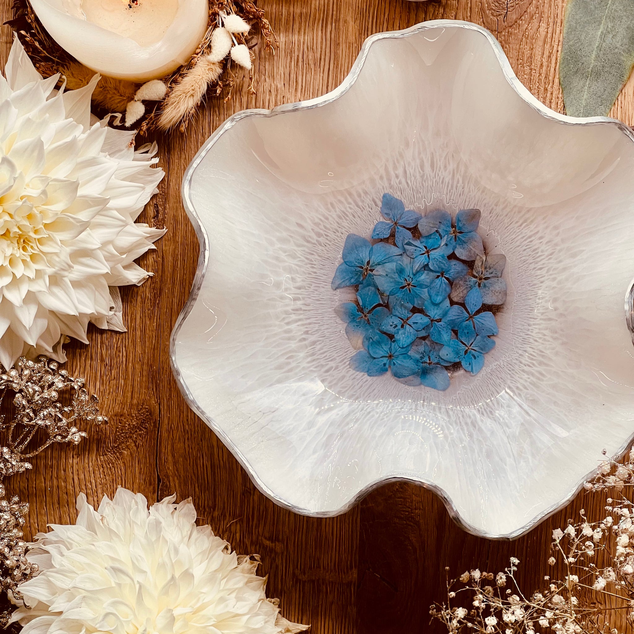 White resin bowl with silver and blue hydrangeas
